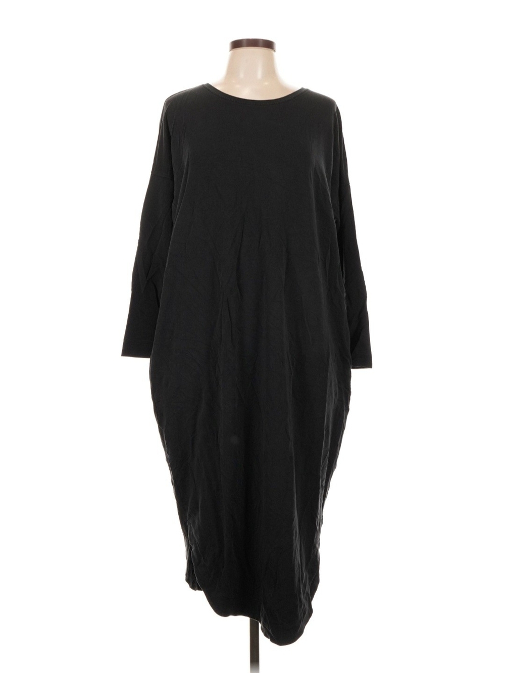 minimalist black long-sleeve midi dress featuring a relaxed Organic cocoon-style